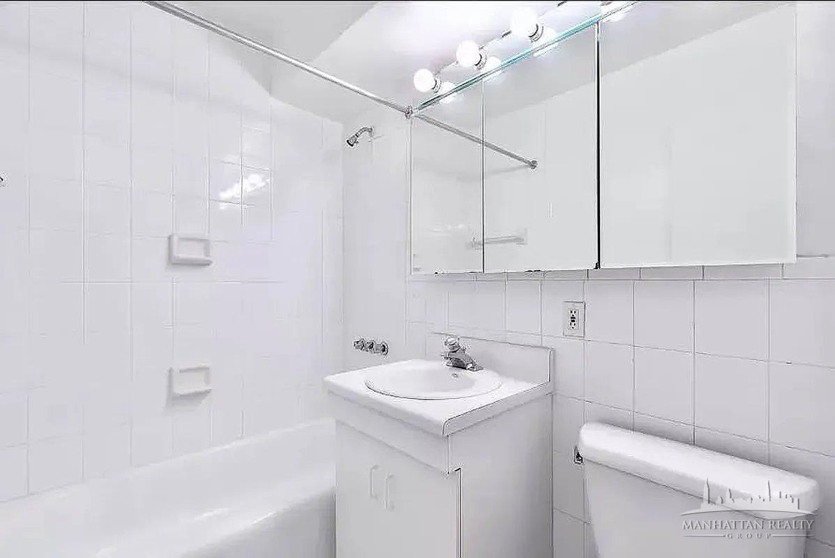 E 39th St #504 - Photo 3 of 4