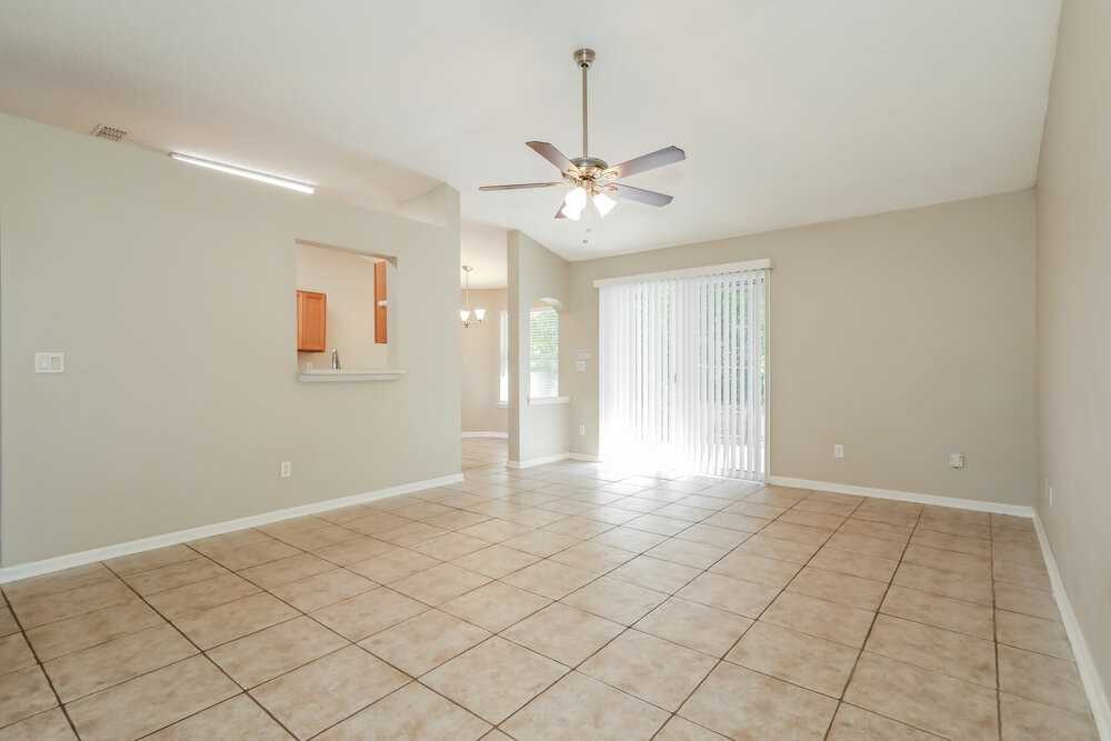 7811 Invermere Blvd N - Photo 3 of 14