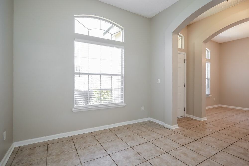 7811 Invermere Blvd N - Photo 4 of 14