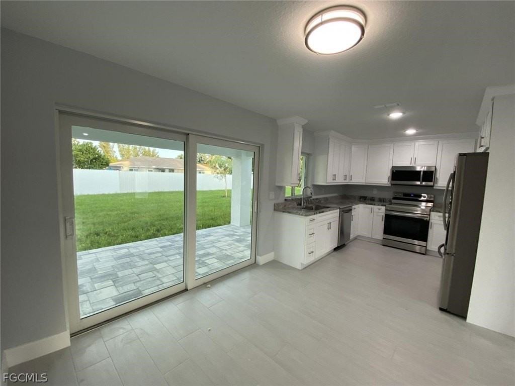 23 Ne 16th Pl - Photo 4 of 11