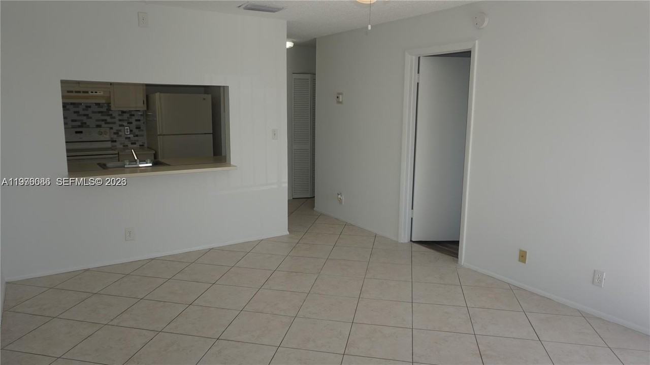 10057 Winding Lake Rd #204 - Photo 4 of 13