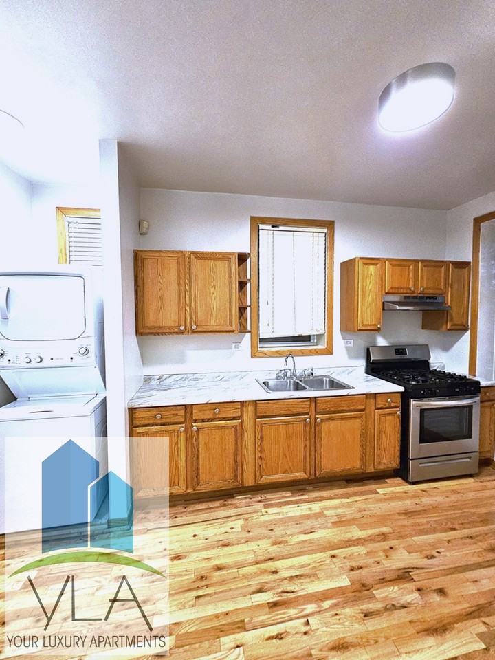 6044 South Rhodes Avenue #2 - Photo 2 of 9