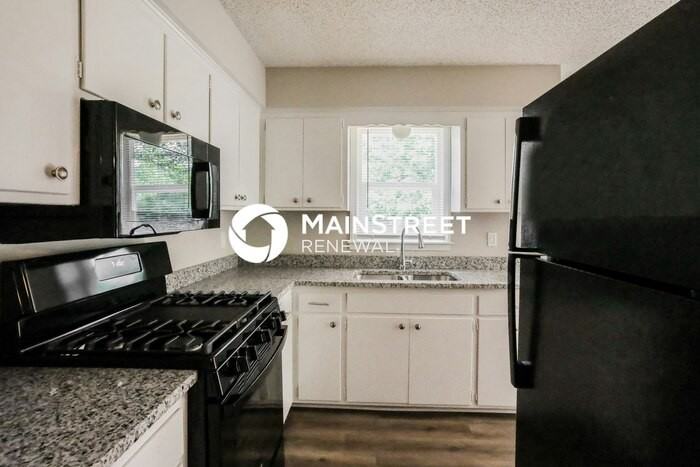 8905 E 90th Ter - Photo 7 of 15