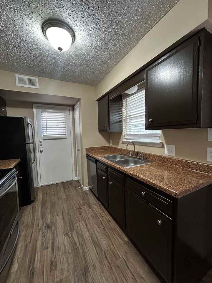 Normandy Townhomes LLC - Photo 2 of 39