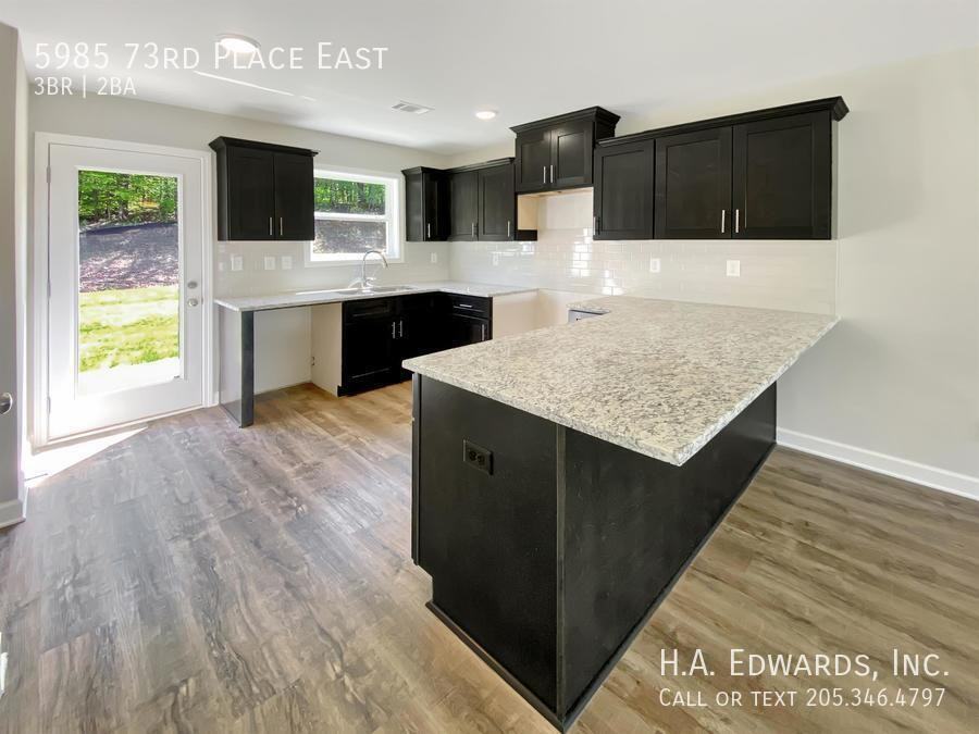 5985 73rd Pl E - Photo 5 of 23