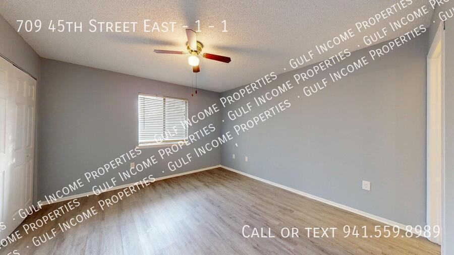 709 45th St E #1 - Photo 5 of 19