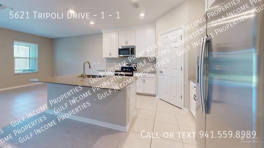 5621 Tripoli Dr #1 - Photo 6 of 36