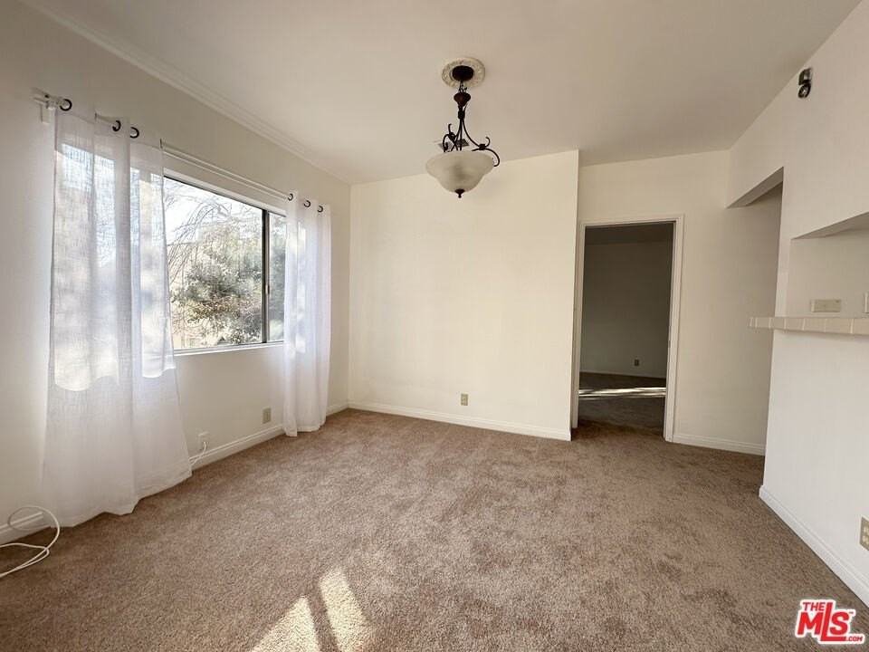 6069 1/2 Cashio St - Photo 3 of 9