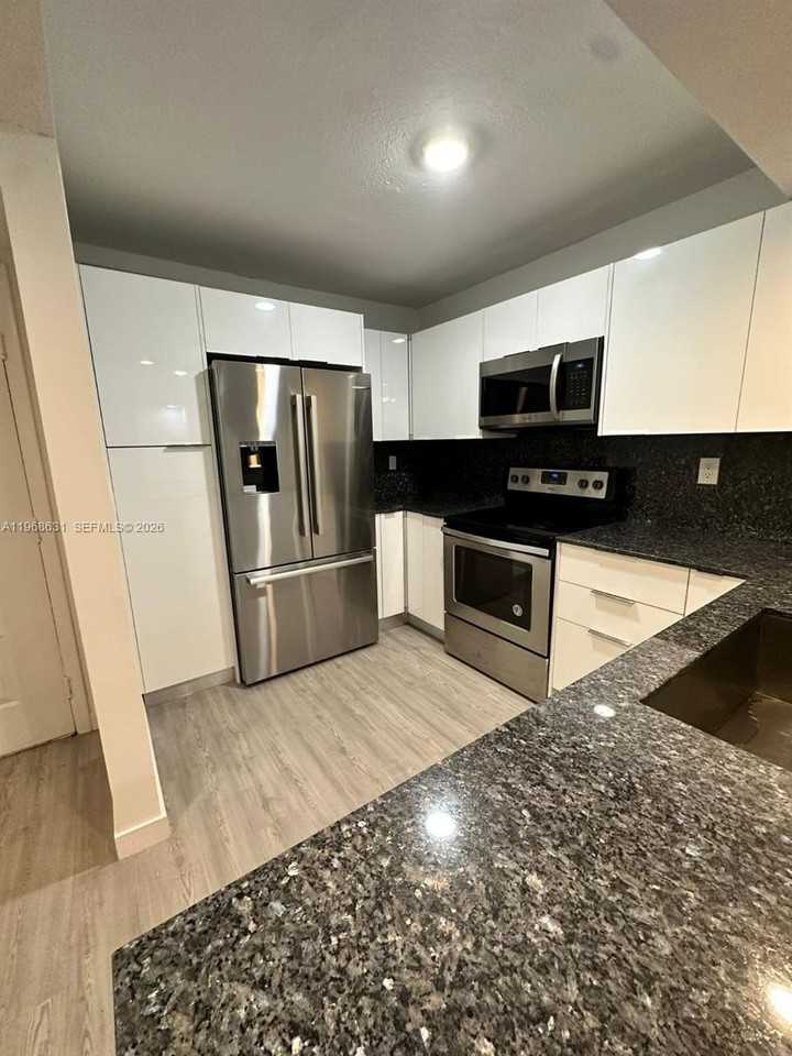 4640 Nw 102nd Ave #104-16 - Photo 3 of 9