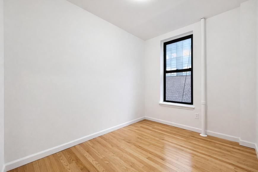 401 E 68th St - Photo 4 of 6