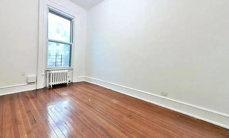 145 E 61st St - Photo 4 of 6