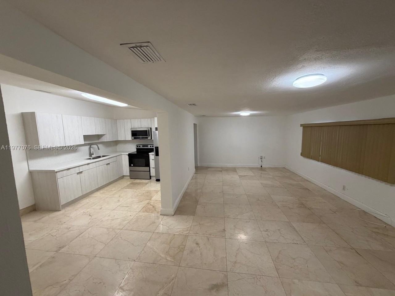 1585 W 53rd St - Photo 2 of 17