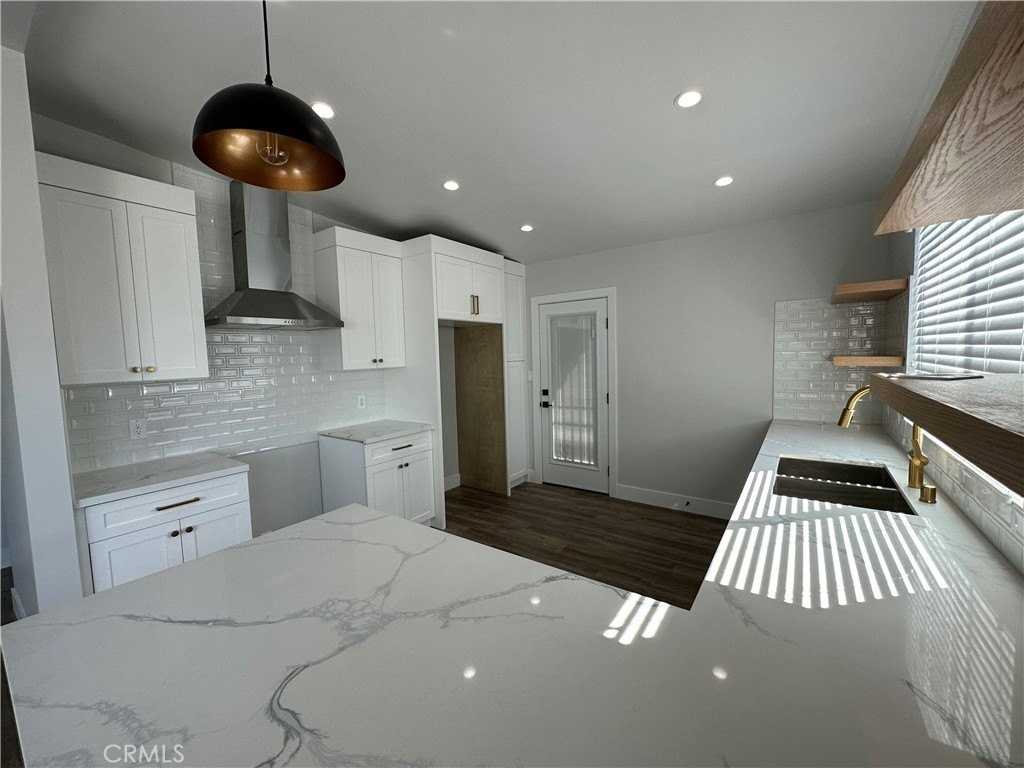 11248 Woodruff Ave - Photo 3 of 11