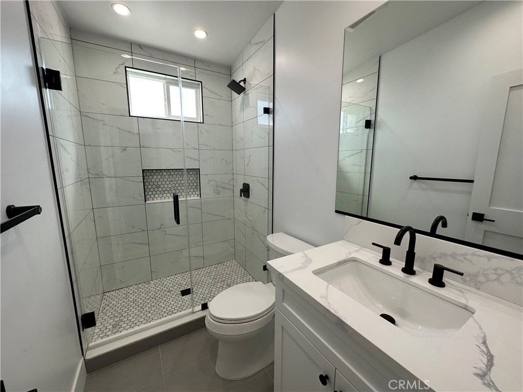 11248 Woodruff Ave - Photo 6 of 11