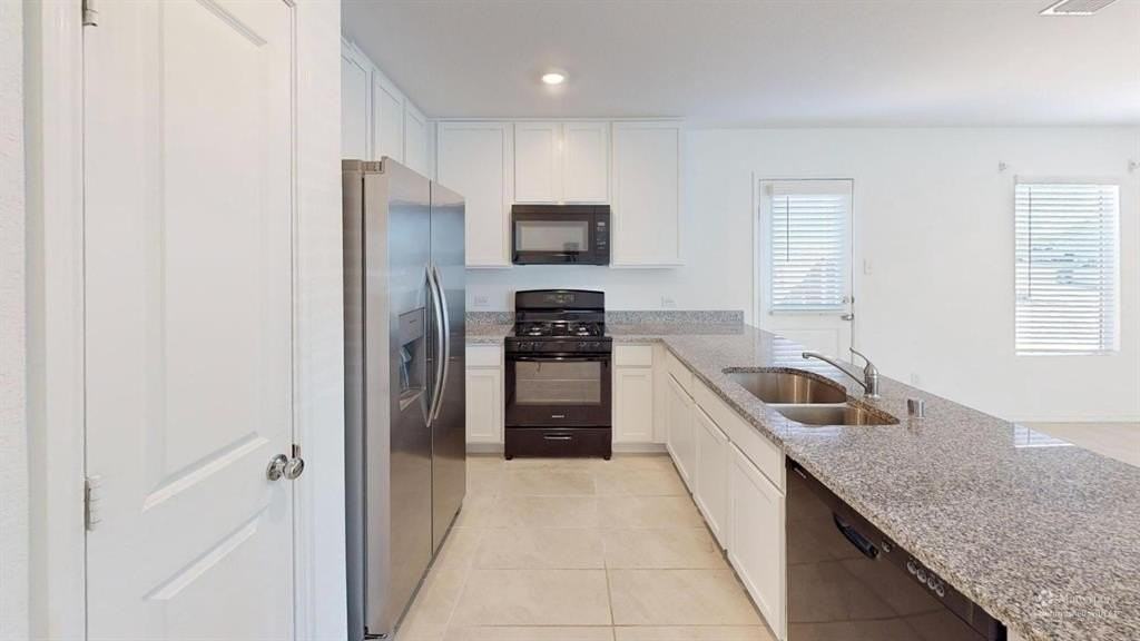 2916 Tibbles Dr - Photo 4 of 17