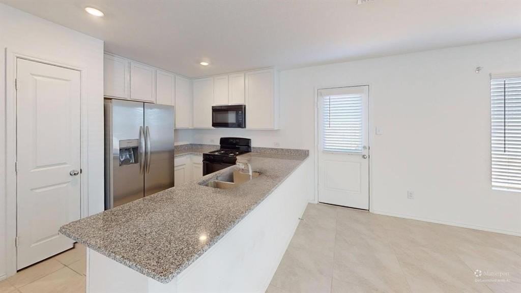 2916 Tibbles Dr - Photo 5 of 17