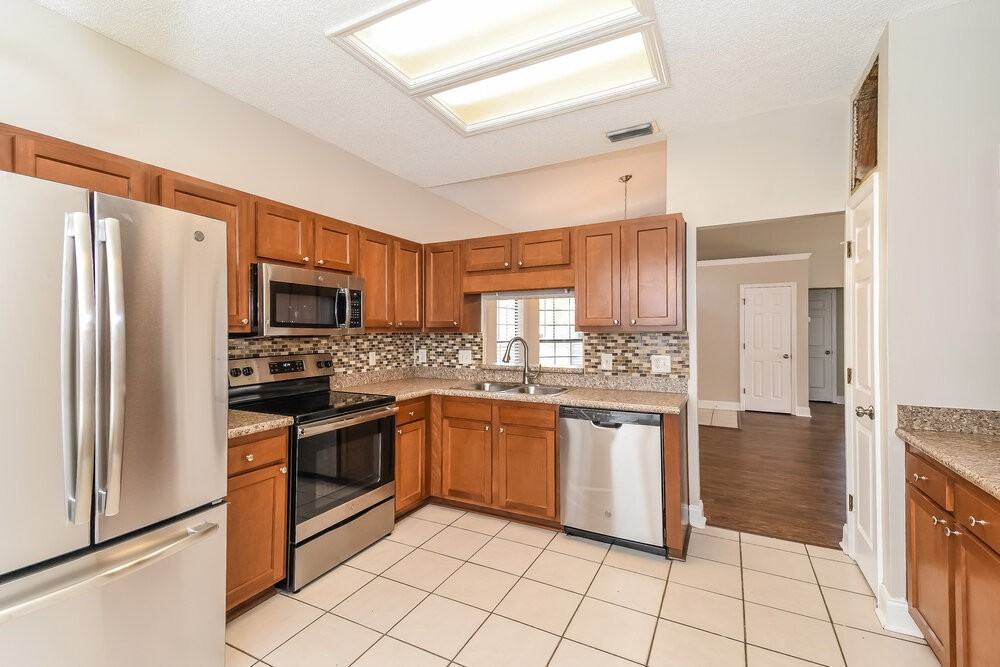 7711 Collins Ridge Blvd - Photo 6 of 16