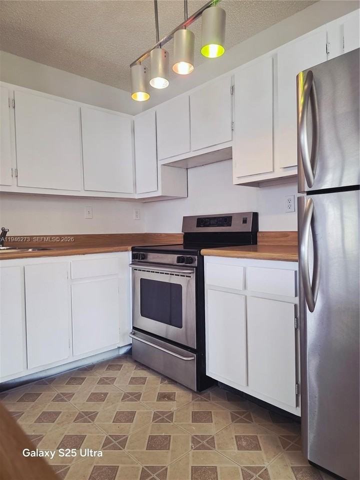 20130 Ne 3rd Ct #6 - Photo 6 of 26