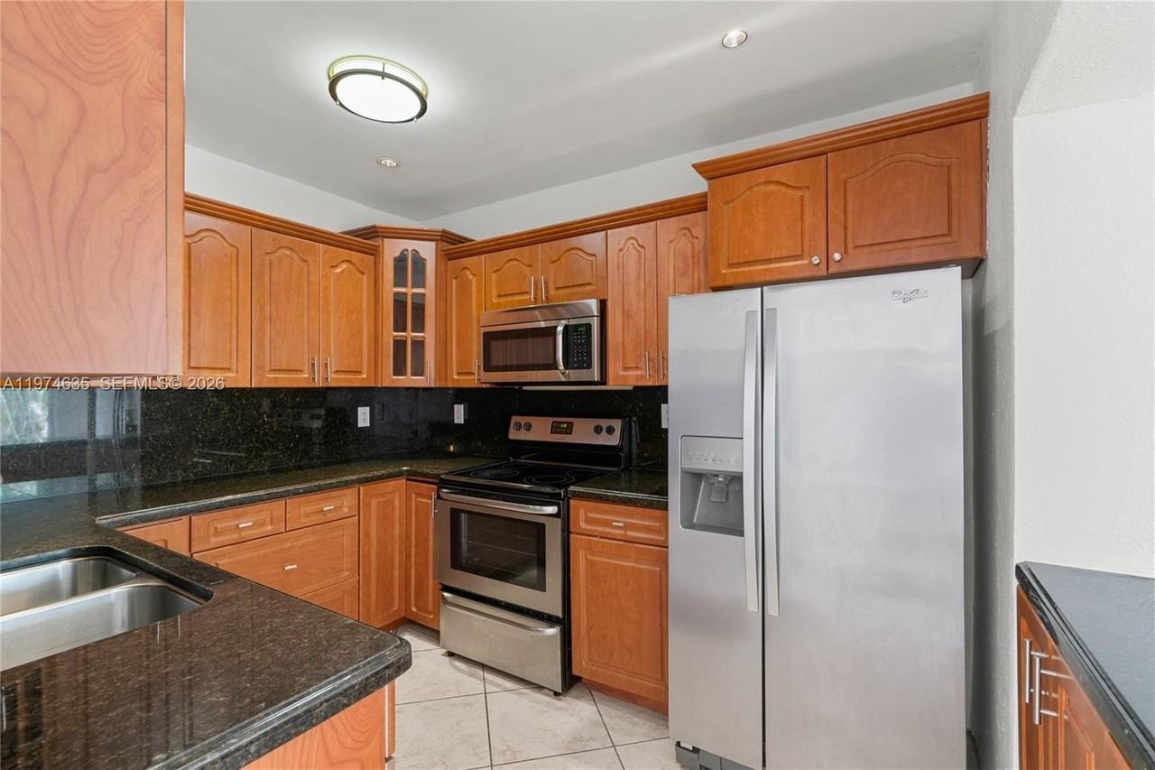 1381 W 63rd St - Photo 2 of 50