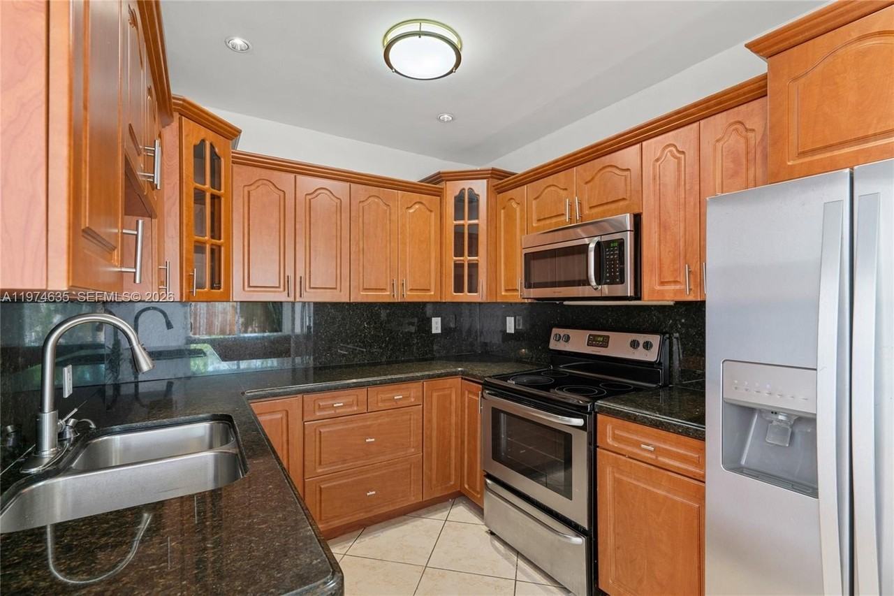 1381 W 63rd St - Photo 3 of 50