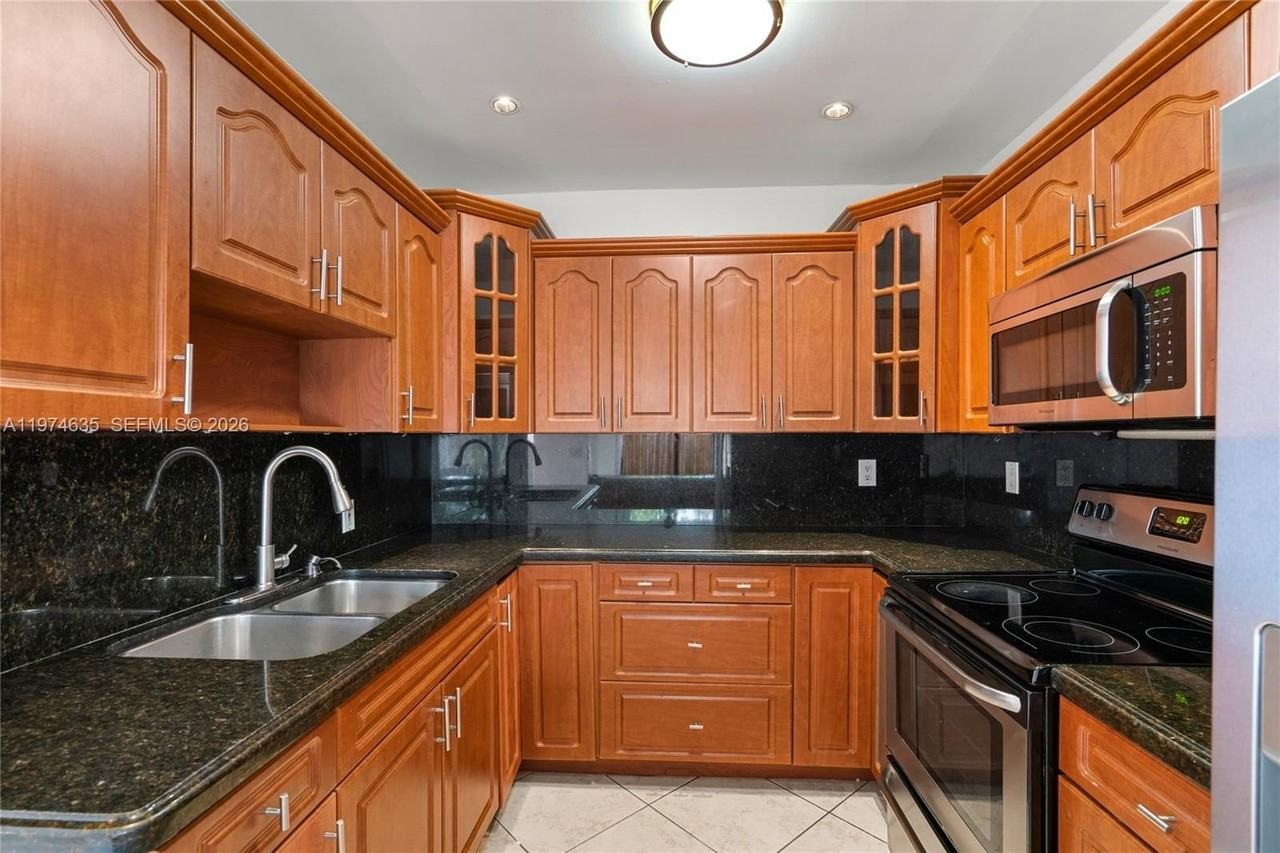 1381 W 63rd St - Photo 4 of 50