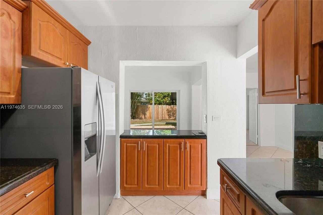 1381 W 63rd St - Photo 5 of 50