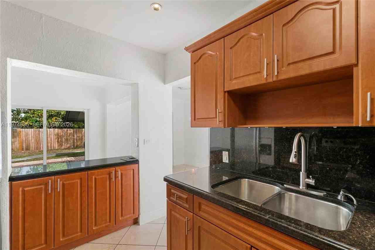 1381 W 63rd St - Photo 6 of 50