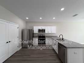 1390 Se Magnolia Loop #104 - Photo 1 of 1