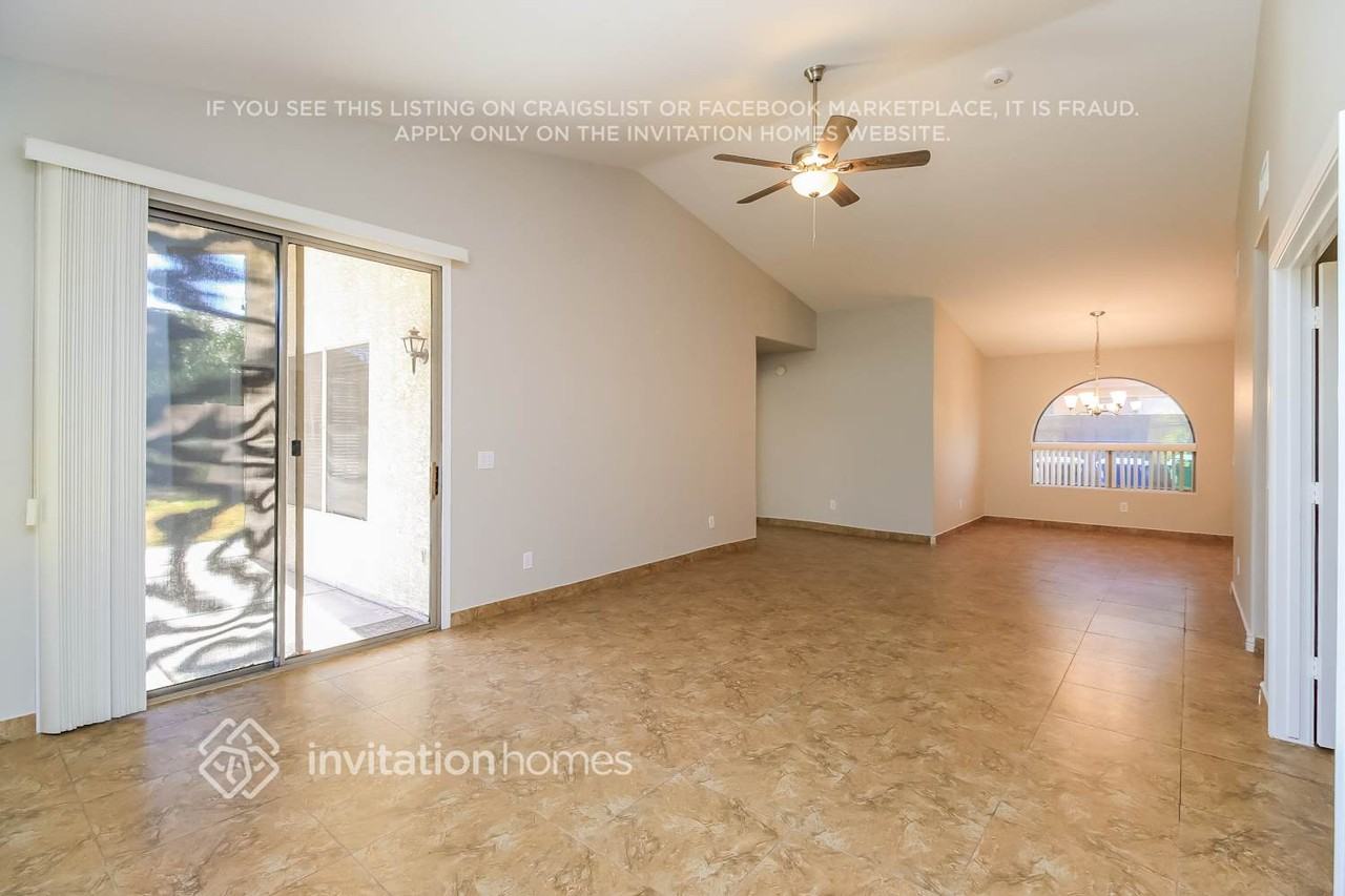 9827 E Olla Ave - Photo 3 of 16