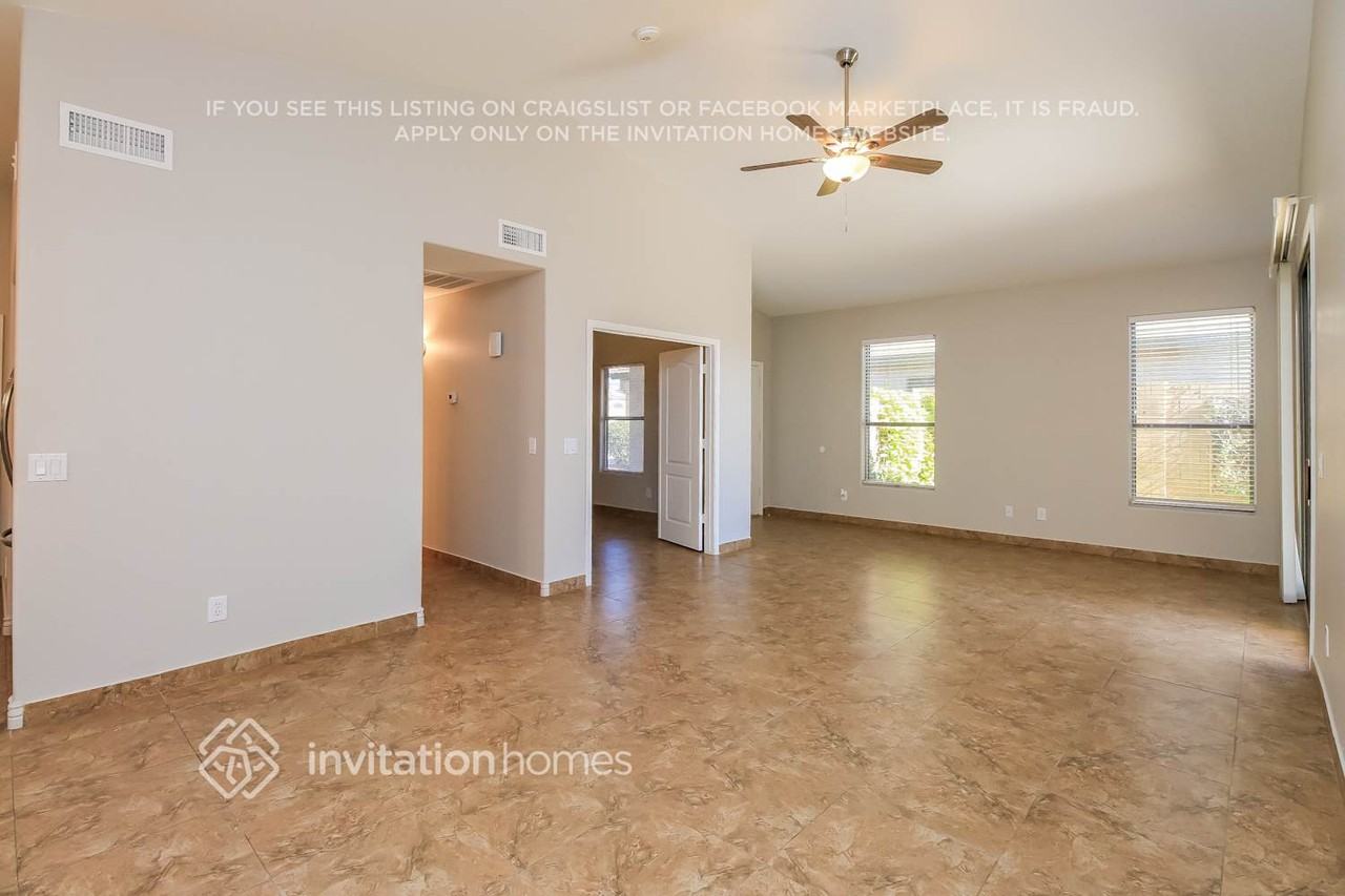 9827 E Olla Ave - Photo 4 of 16