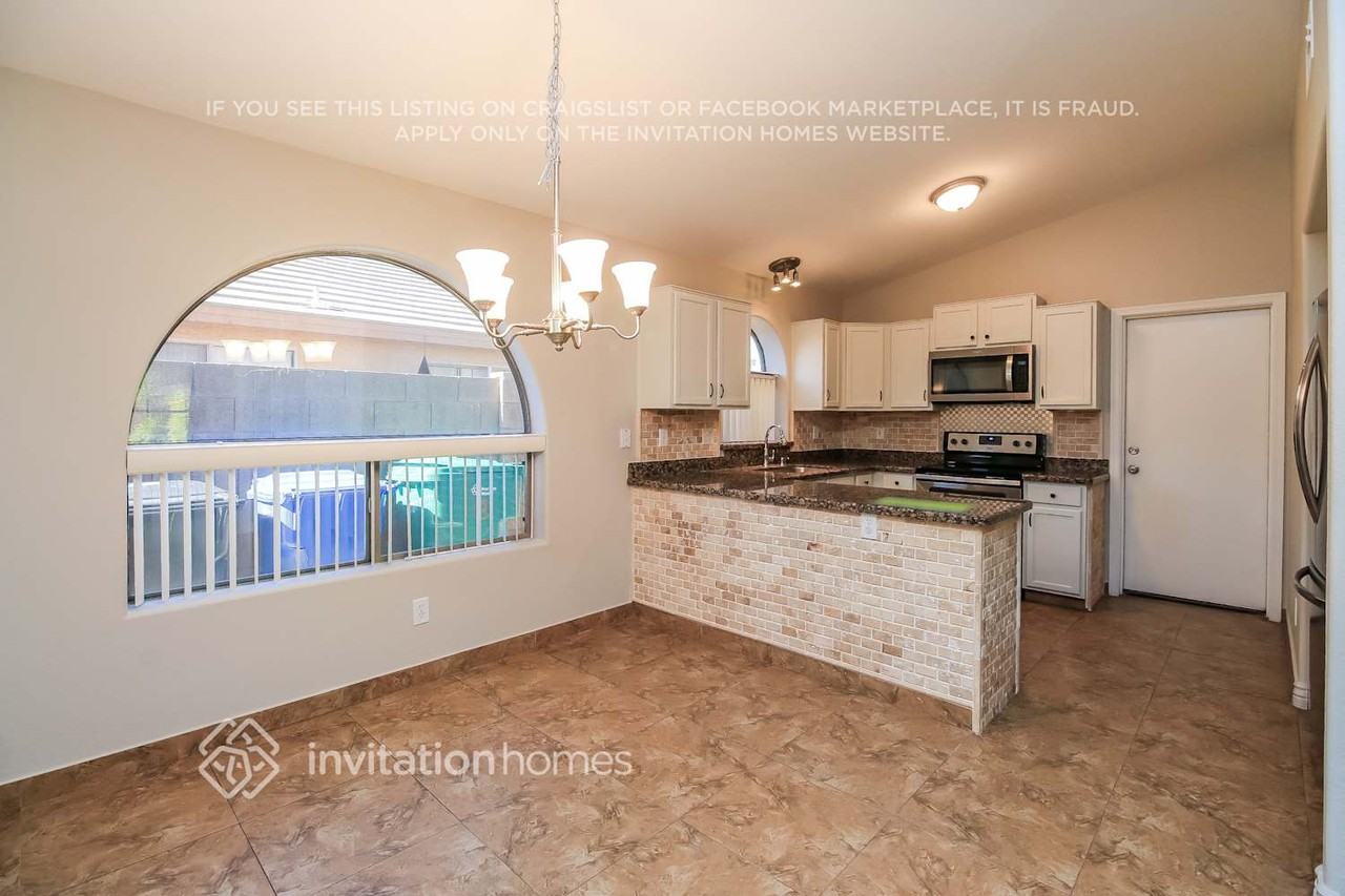 9827 E Olla Ave - Photo 7 of 16