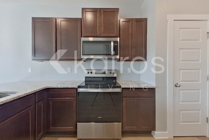 6107 Stonewater Ct Nw - Photo 7 of 28