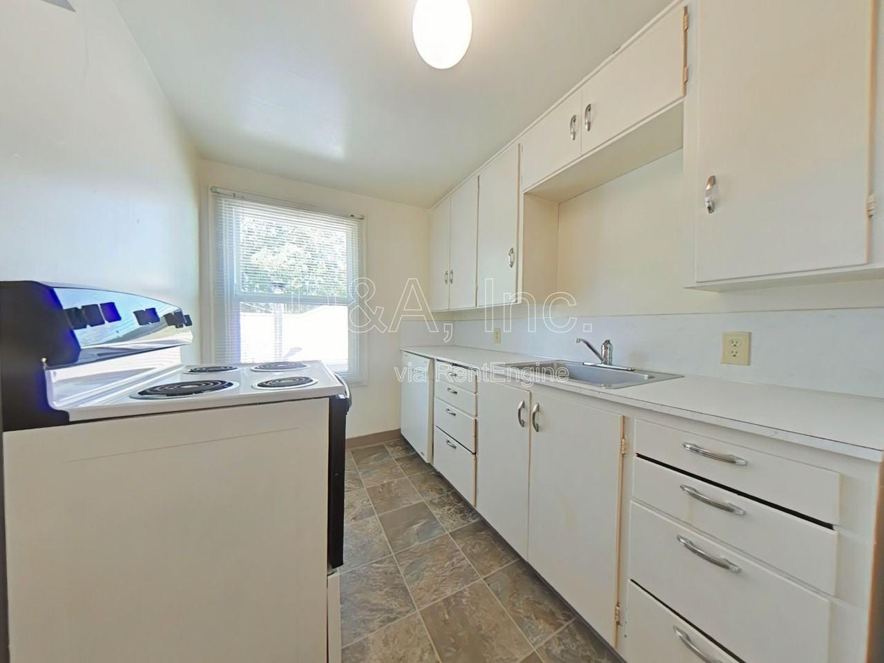 2657 Nw Harrison Blvd - Photo 3 of 7