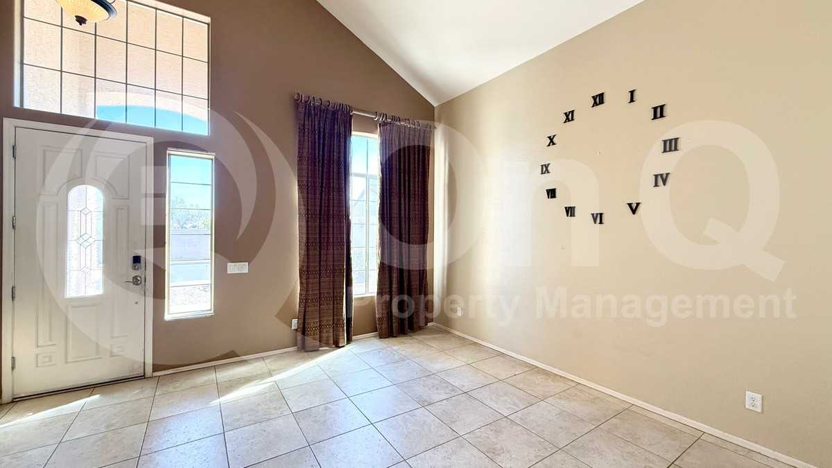 9710 S 44th Dr - Photo 3 of 32