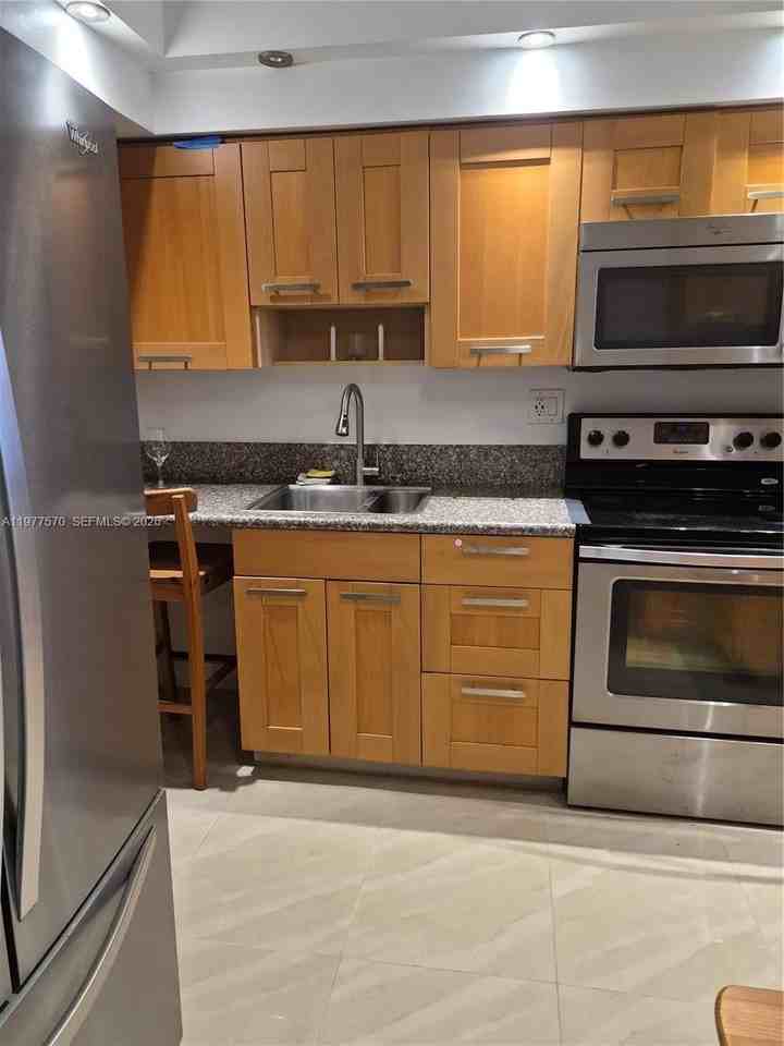 8300 Sands Point Blvd #K106 - Photo 2 of 36