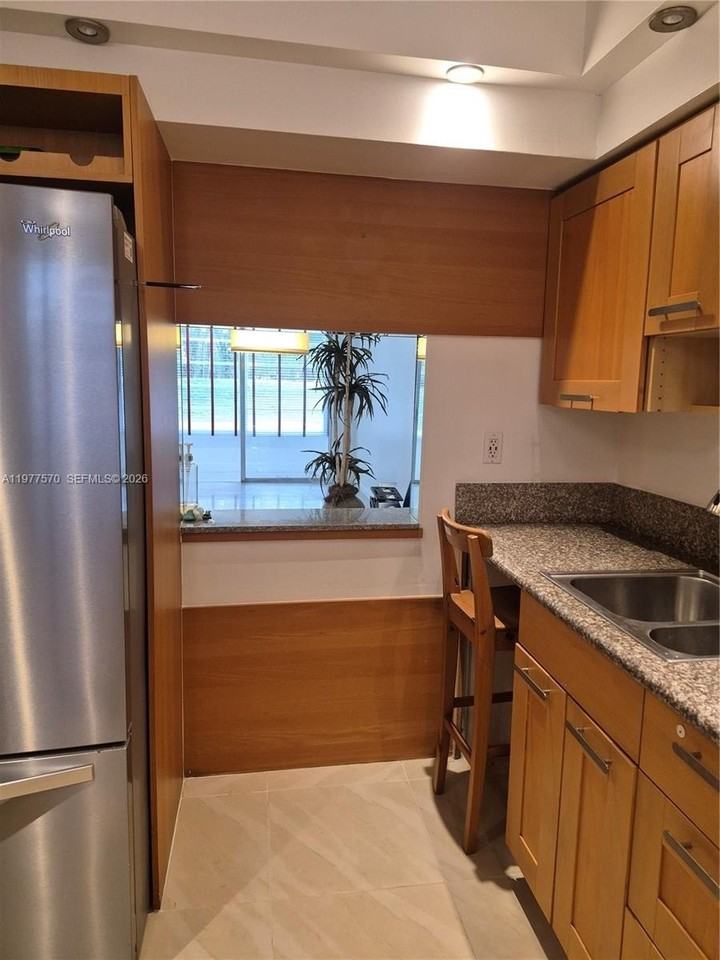 8300 Sands Point Blvd #K106 - Photo 3 of 36