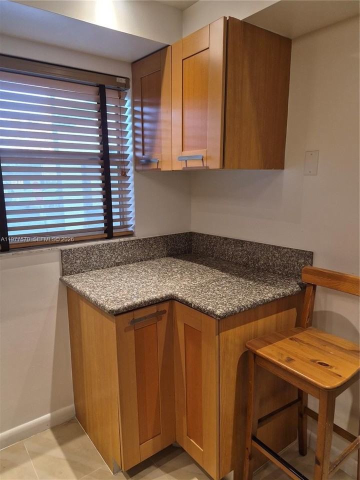 8300 Sands Point Blvd #K106 - Photo 4 of 36