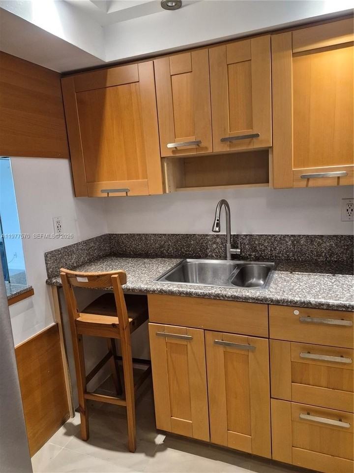 8300 Sands Point Blvd #K106 - Photo 5 of 36