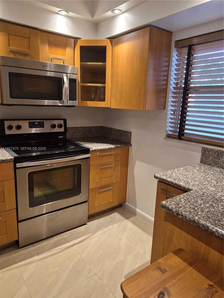 8300 Sands Point Blvd #K106 - Photo 6 of 36