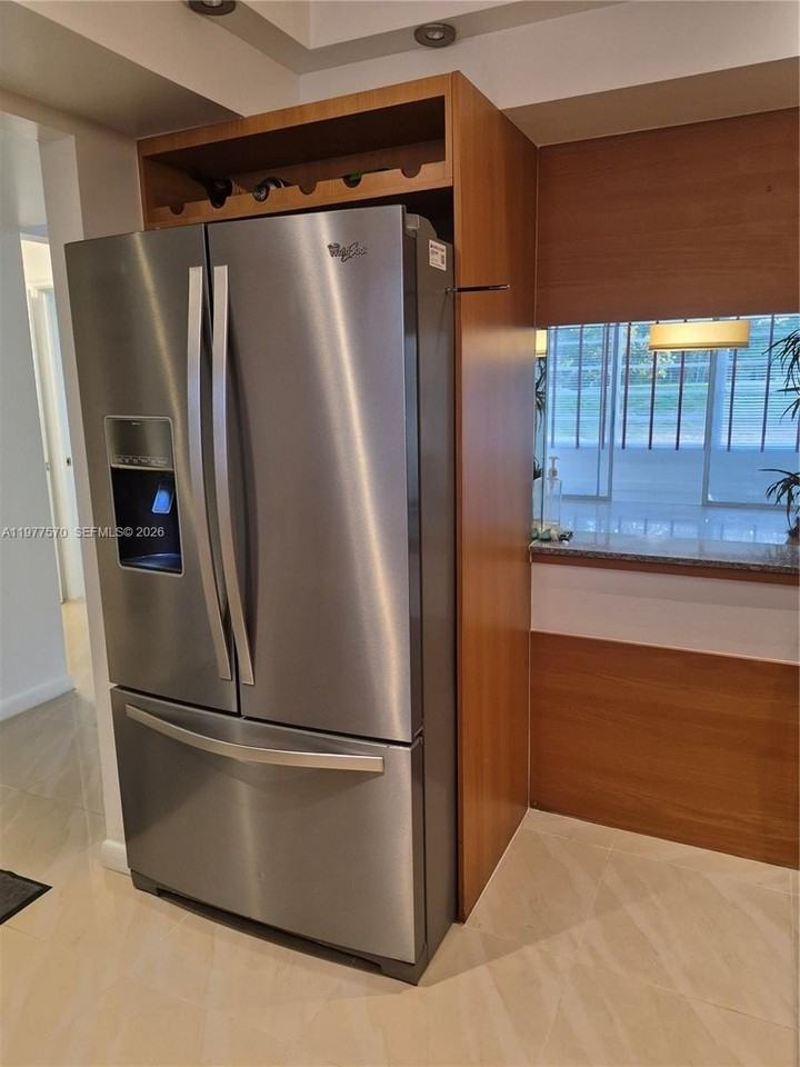 8300 Sands Point Blvd #K106 - Photo 7 of 36