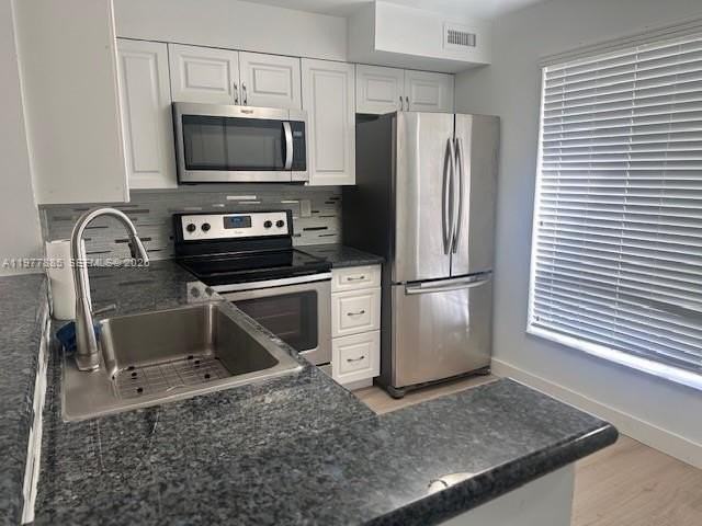 709 Gardens Dr #102 - Photo 2 of 22