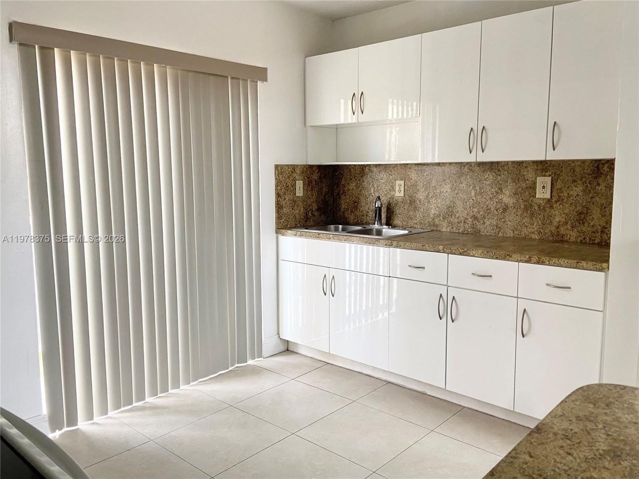 2740 W 62nd St #203 - Photo 3 of 14