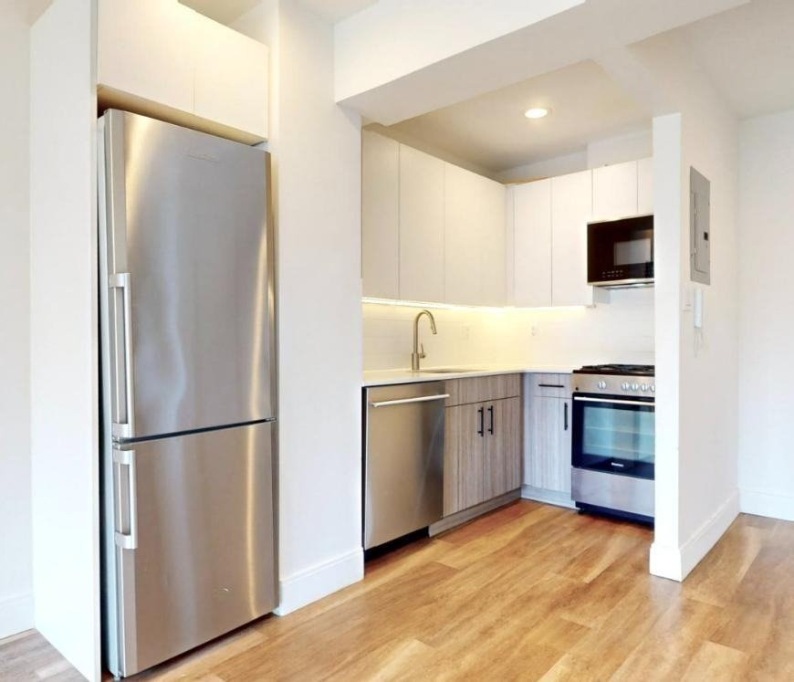 220 E 26th St - Photo 7 of 9