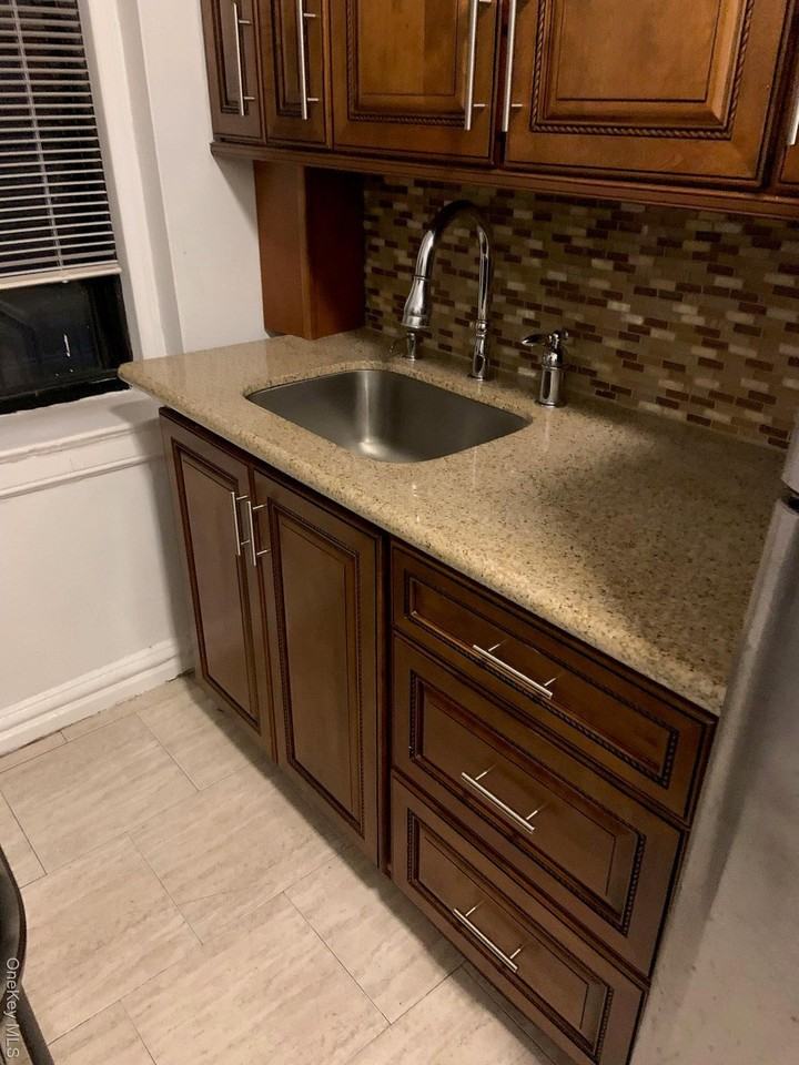 7720 Austin St Apt 2e - Photo 2 of 13