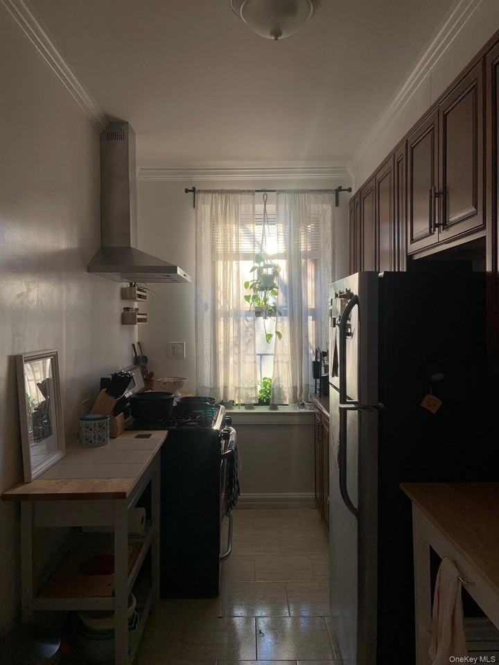 7720 Austin St Apt 2e - Photo 6 of 13