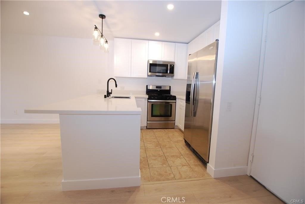 6820 Remmet Ave - Photo 2 of 14