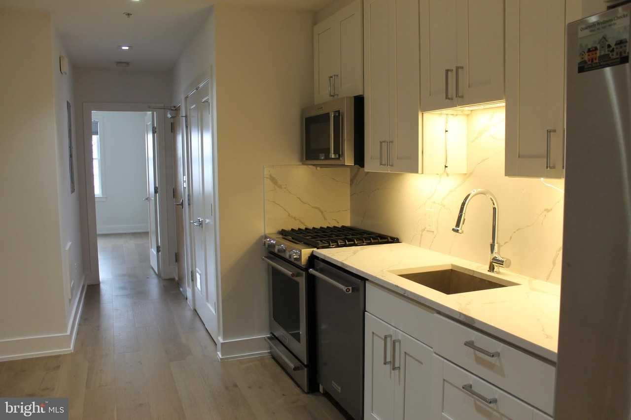 5110 Fort Totten Dr Ne Apt 4 - Photo 3 of 28