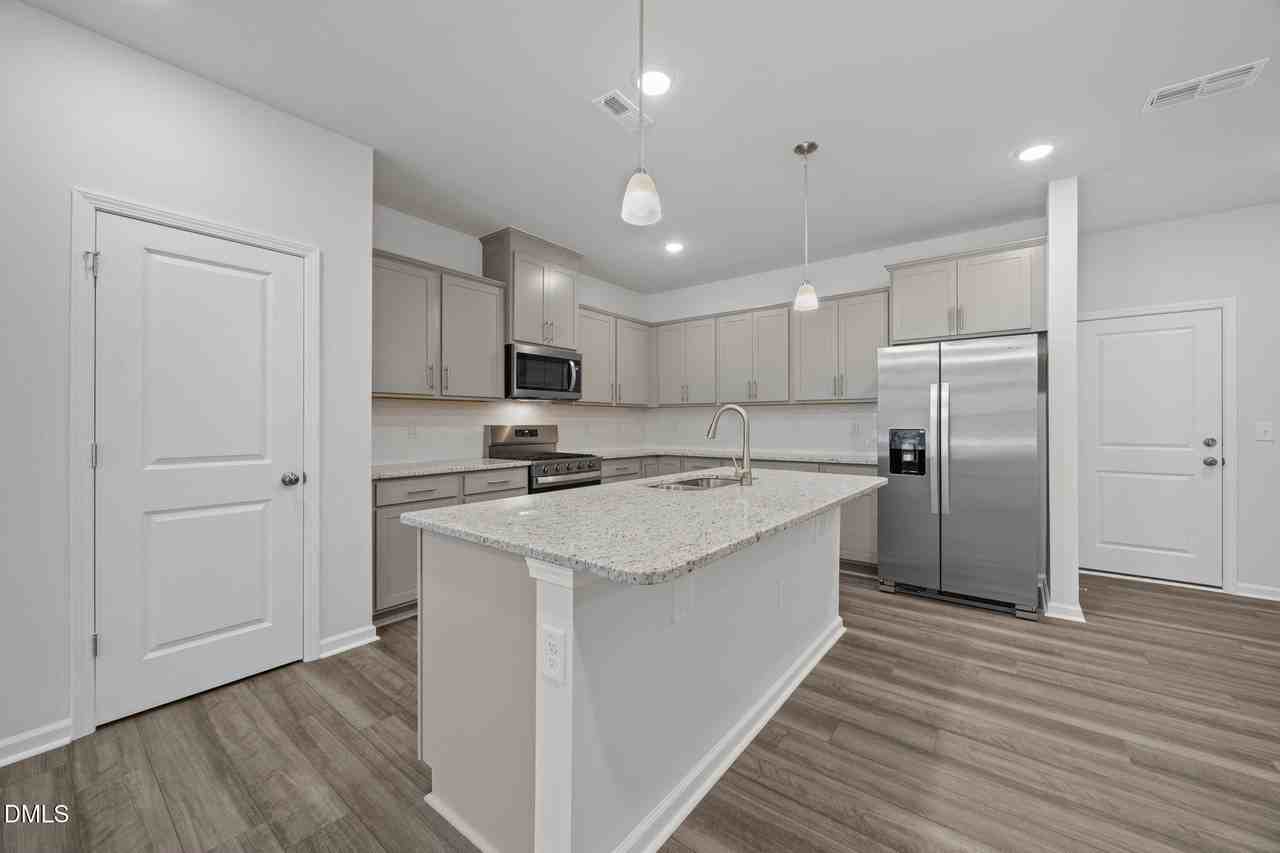 202 Fosterton Cottage Way - Photo 2 of 13
