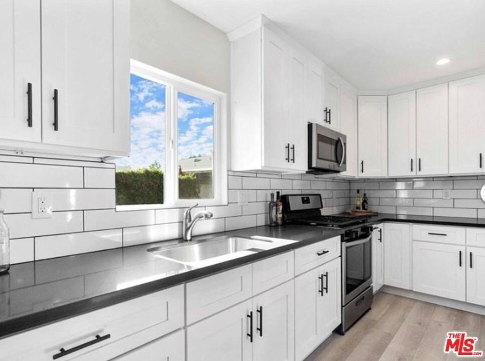 6651 Aldea Ave - Photo 4 of 18