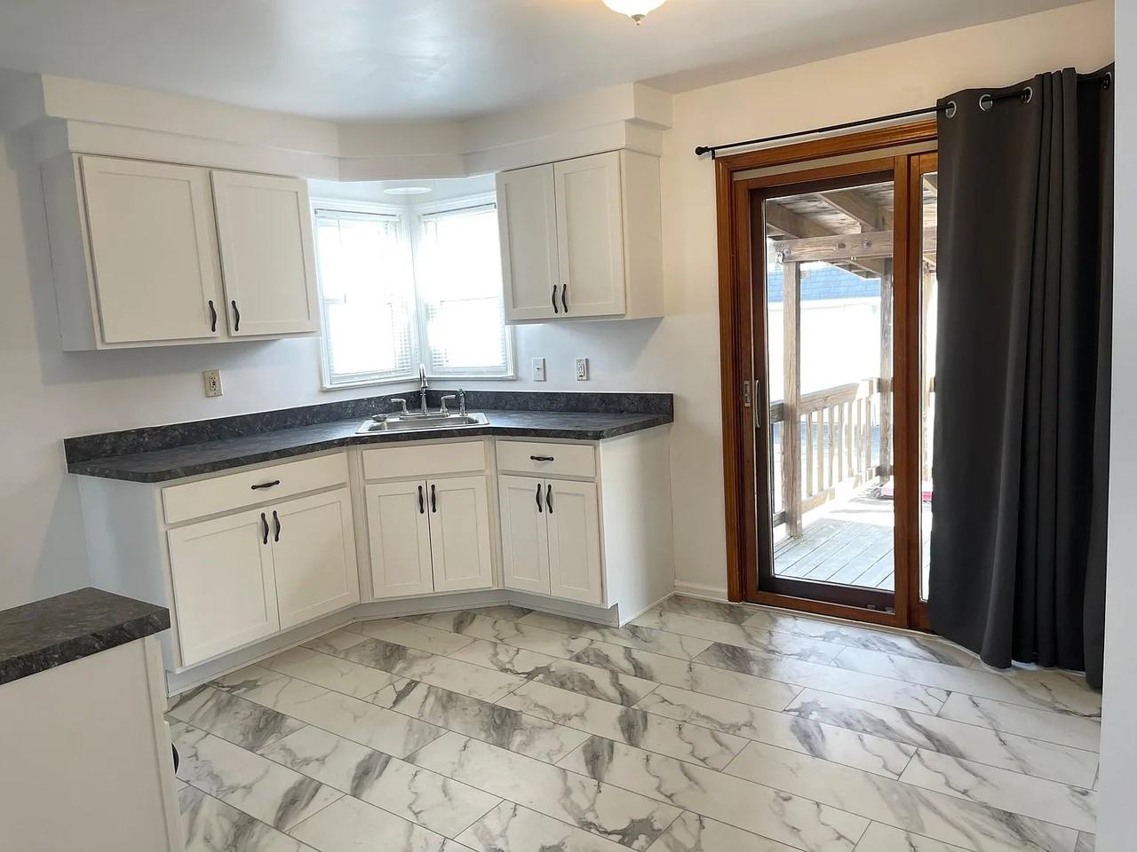 15812 Rockside Rd - Photo 3 of 15